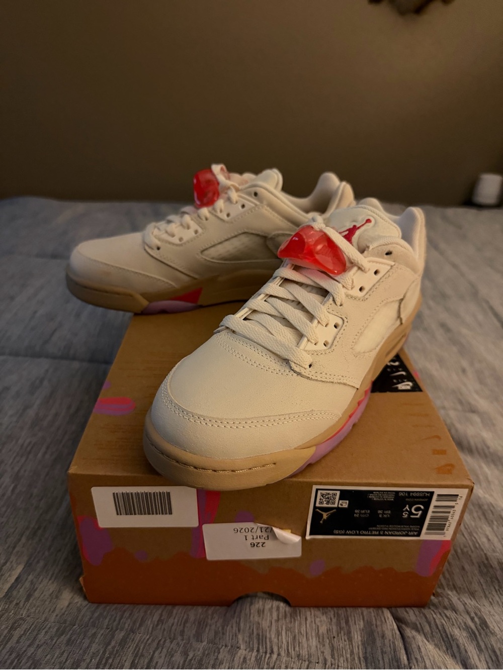Jordan Women's Low-Top Sneakers in Cream with Red Accents pbj edition